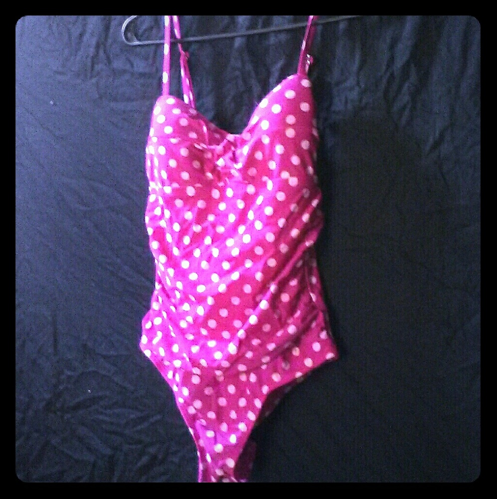 Pink polka dotted swimming suit